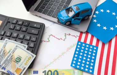 Birleşik Devletler ve Avrupa Birliği bayrakları, dolar ve çizelgeler. Yüksek kalite fotoğraf