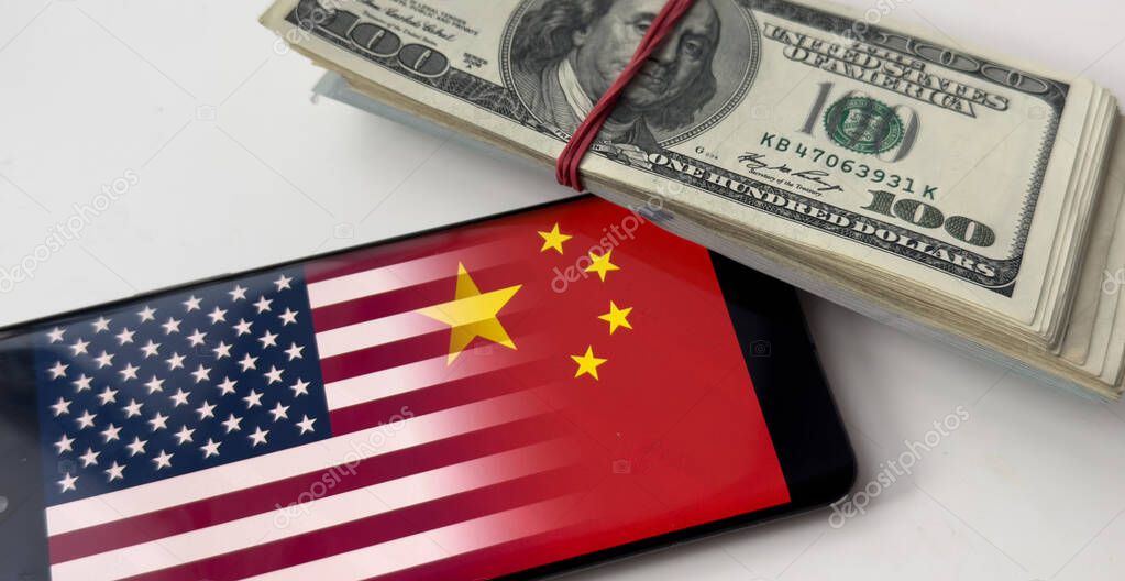 Flags of the USA and China, dollars. High quality photo