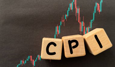 Arkaplanda bulanık bir şamdan grafiği olan Cpi harfleri yatırımları, finansal büyümeyi ve piyasa dalgalanmalarını sembolize ediyor. Yüksek kalite fotoğraf