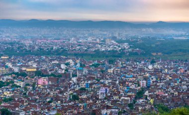 Aerial View of Cityscape at Rajasthan surrounded by Mountains. clipart