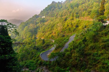 Landscape view of curvy hill roads. clipart