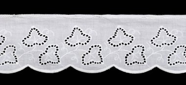 white floral lace isolated on black background