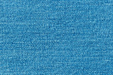 Kot pantolonun kumaşı. Tuval mavisi kot. Grunge blue jean 'in üst görünümü.