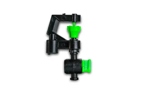 Kleine Schwarze Und Grüne Kunststoff Wassersprenger Isoliert Auf Weißem Hintergrund — Stockfoto