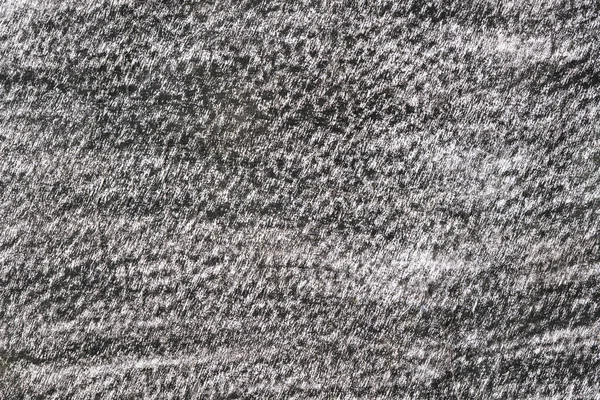 Top view of graphite pencil texture on white paper grunge smudge messy horizontal format as background.