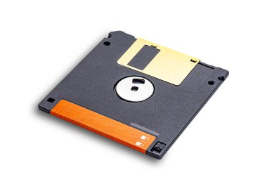 High angle view of single old data storage technology black floppy disk isolated on white background with clipping path. clipart