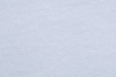 Pamuk tekstil materyalinin doğal beyaz dokusu. Beyaz pamuk kumaş dokusuna yakın çekim.