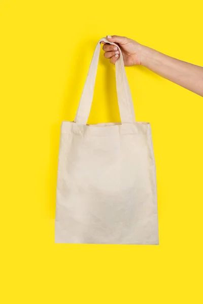 Woman Hand Holding Blank White Tote Bag Yellow Background Copy — Stock Photo, Image