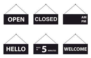 Signs for shops in black and white