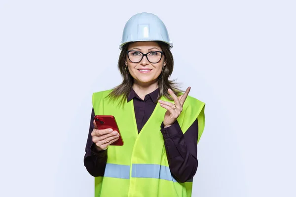 Woman Industrial Logistic Builder Worker Helmet Vest Smartphone Using Mobile — Stock Photo, Image