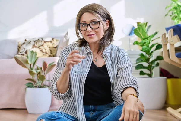 Smiling Mature Woman Glass Water House Middle Aged Female Drinking — Stockfoto