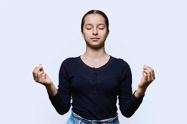 Teenage Relaxed Girl Headphones Closed Eyes Making Meditation Gesture Fingers — Stock Photo, Image