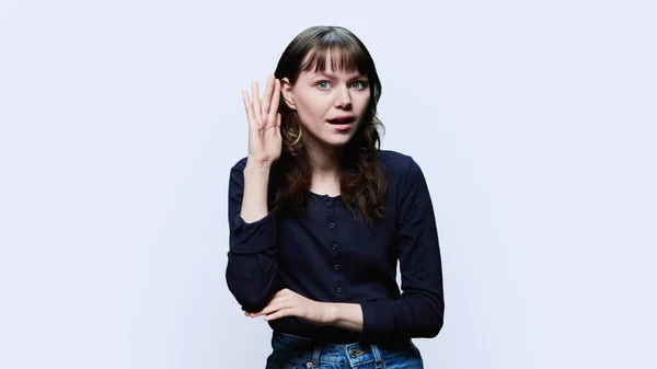 Young Attractive Female Holding Hand Ear Listening Attentively White Studio — Fotografia de Stock