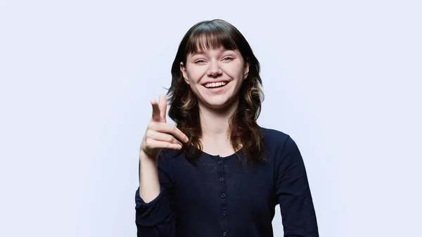 Laughing Cheerful Young Female Pointing Finger Camera You White Studio — 스톡 사진