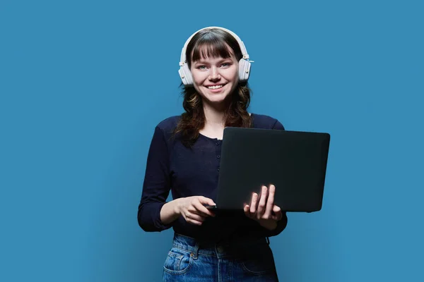 Smiling Female Student Years Old Headphones Looking Camera Blue Background — Fotografia de Stock