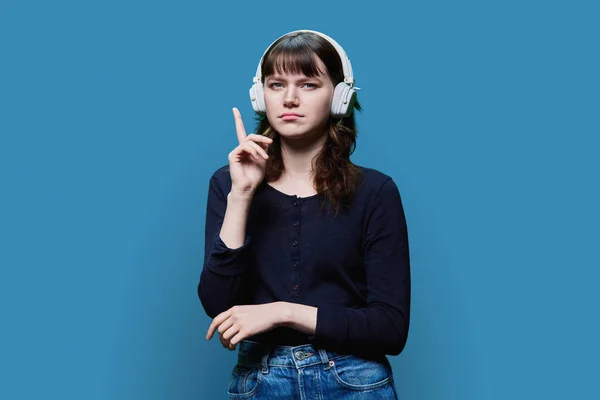 Serious Pensive Attractive Young Female Wireless Headphones Looking Camera Showing — Fotografia de Stock