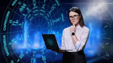 Young woman with laptop looking at camera, astrological symbols and signs background. Horoscope, zodiac signs, astrology, numerology, forecast service concept clipart