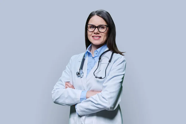 Portrait Positive Confident Female Doctor White Coat Crossed Arms Looking — Stock Photo, Image
