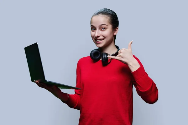 Young Teenage Female Red Open Laptop Showing Call Gesture Gray — Stock Photo, Image