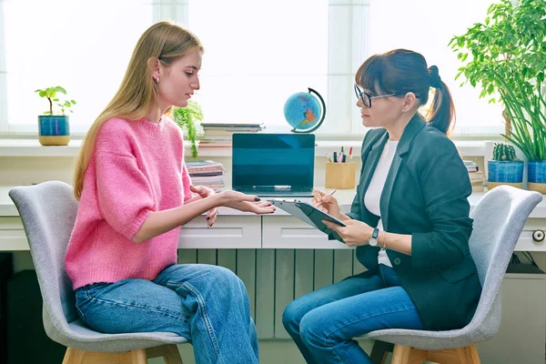 Psychologist, social worker, behavior talking with teenage girl student, counselor with clipboard. Psychology psychotherapy therapy, adolescence youth, social life, mental health concept