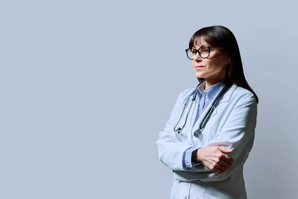 Serious Mature Confident Woman Doctor White Lab Coat Stethoscope Profile — Stock Photo, Image
