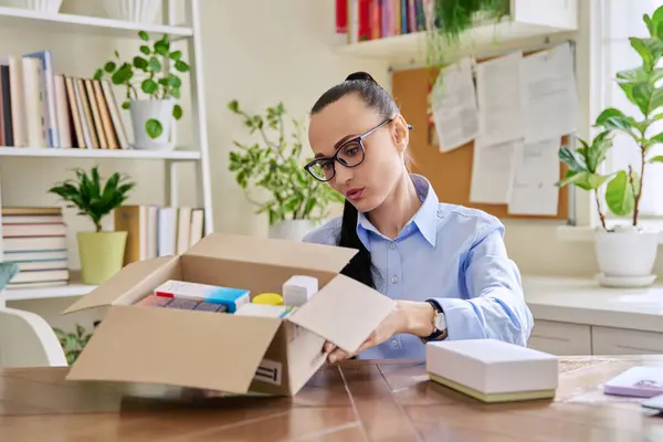 Satisfied Female Consumer Buyer Sitting Home Unpacking Cardboard Box Online — Stock Photo, Image