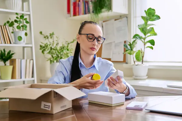 Satisfied Female Consumer Buyer Sitting Home Unpacking Cardboard Box Online — Stock Photo, Image