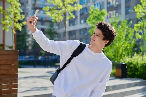 Young Guy Student Smartphone His Hands Taking Selfie Outdoor Portrait Stok Gambar Bebas Royalti