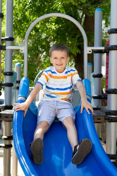 Child Playing Outdoor Playground Active Boy Rides Slide — Stock Photo, Image