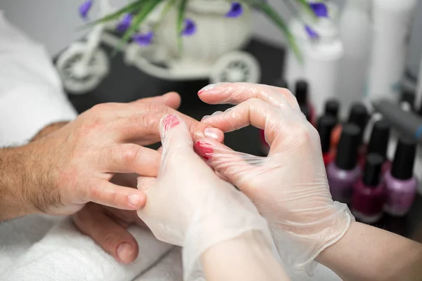 Manicure, Hands spa Cuticle oil. Beautiful man hands closeup. Manicured nails. Beauty hands. Beauty treatment.