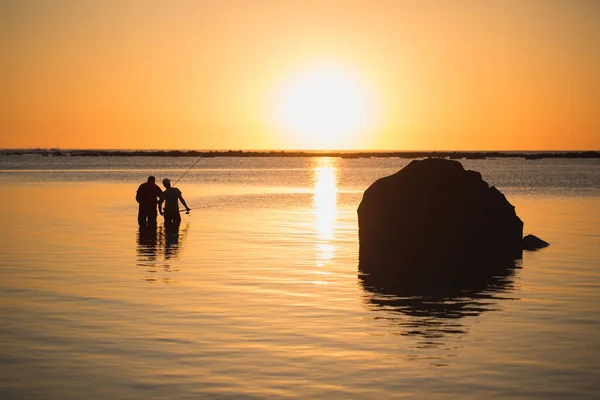 Two Men Fishing Ocean Beach Sunset — Stock Photo, Image