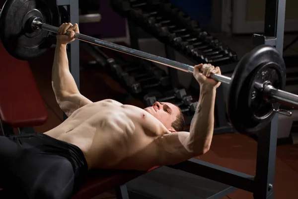 Brutal Athletic Man Pumping Muscles Bench Press — Stock Photo, Image