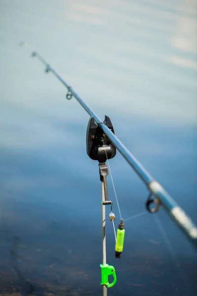 stock image Freshwater fishing with fishing rods on the shore of the pond, lake