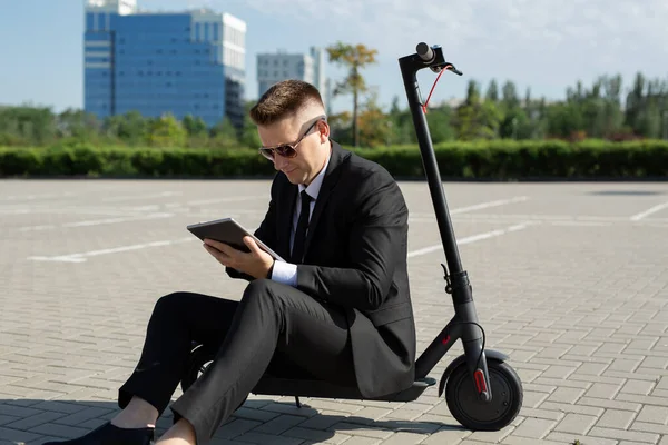 Young Handsome Businessman Suit Sitting Electric Scooter Looking Laptop — Stock Photo, Image