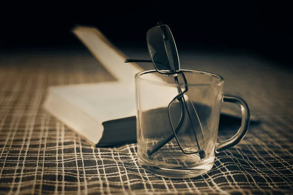 Engrossed Reading Stirring His Drink His Glasses — Stock Photo, Image