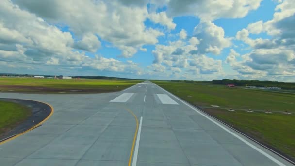 Modern Runway Attached Taxiway Runs Green Meadow Sky Fluffy Clouds — Stock Video