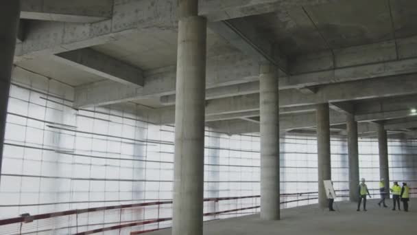 Inspectors Uniform Checkup Unfinished Stadium Building Standing Hall Concrete Column — Stock video
