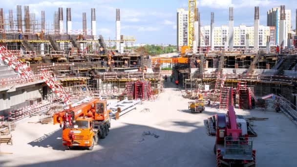 Timelapse Workers Walking Unfinished Stadium Building Machines Open Construction Site — Vídeo de Stock