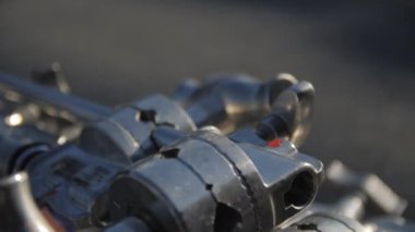 Silver camera holder for smooth shooting of episode for upcoming film. Preparation of equipment and supplies for filming movie