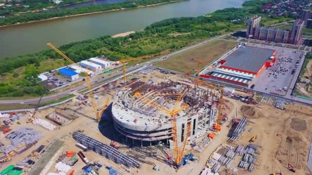 Construction Process Modern City Stadium River Bank Sunny Day Cranes — Vídeos de Stock