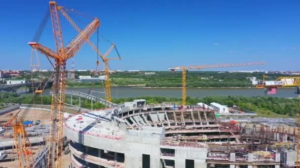 Building Modern City Stadium River Sunny Day Cranes Operate Arena — ストック動画