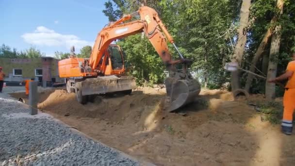 Almaty Kazakhstan May 2023 Orange Bulldozer Scoops Sand Bucket Build — Stock Video