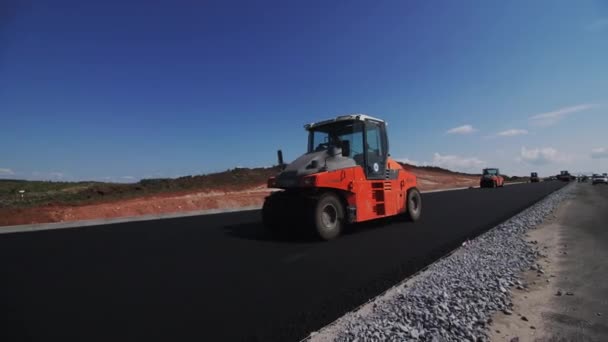 Roller Truck Drives Road Compacting Hot Asphalt Clear Sky Machine — Stock Video