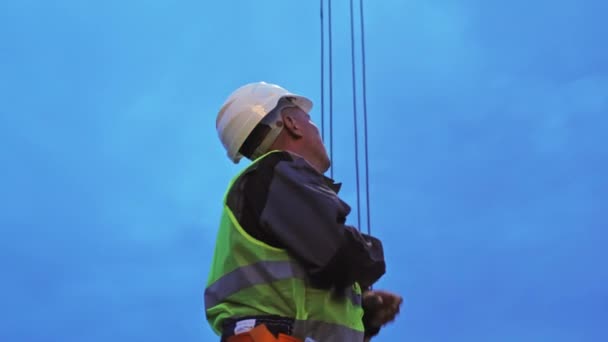 Almaty Kazakhstan August 2023 Professional Man Helmet Looks Upward Crane — Stock Video