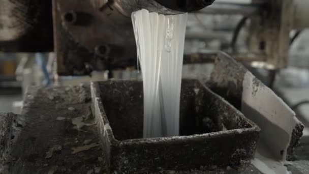 Hot Plastic Flows Pouring Metal Container Plant Workshop Closeup Waste — Vídeos de Stock