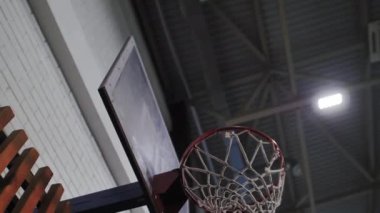 Basketball hoop in large facility for game in sports center. Basketball equipment for local teams to play basketball during preparation for competition