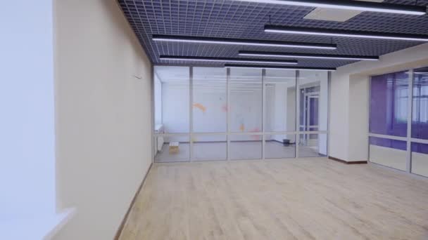 Room Long Lamps Casting Soft Light Throughout Office Space Room — Stockvideo