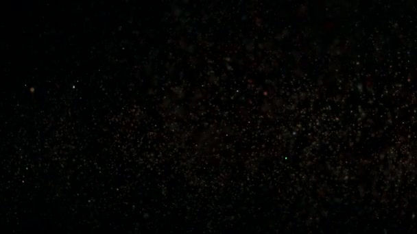 キラキラ光る粒子や火花の背景 — ストック動画