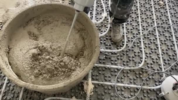 Shoot Mixing Concrete Using Electric Mixer — Video