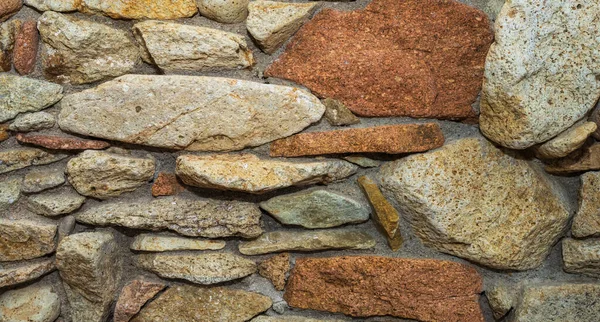 Fragment Einer Natursteinmauer Als Hintergrund Oder Textur Die Struktur Der — Stockfoto